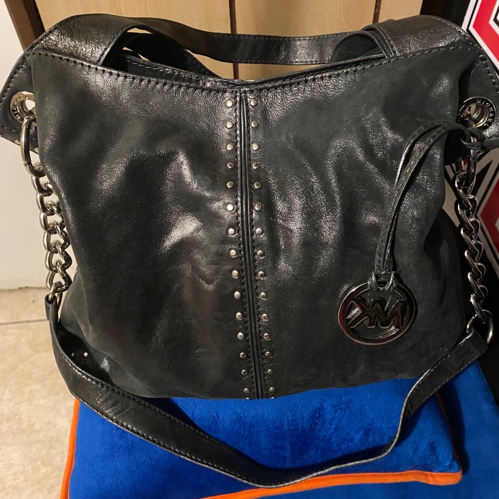Michael Kors grey leather studded shoulder bag.